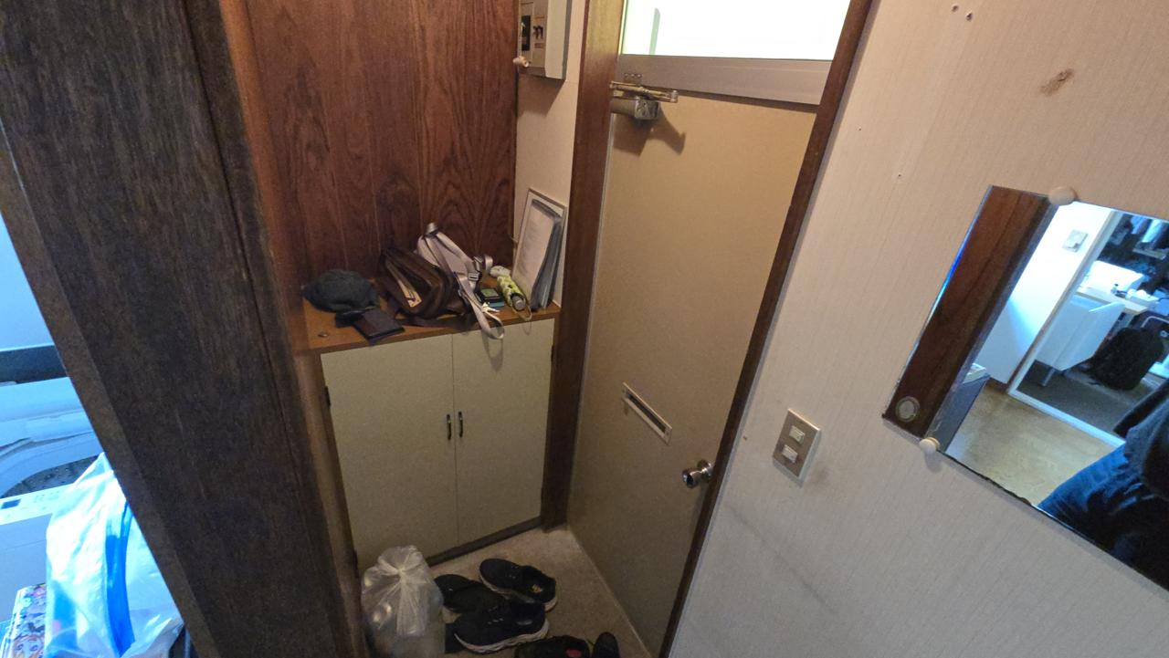 The genkan, where you leave your shoes (and where we leave our purses and such.)