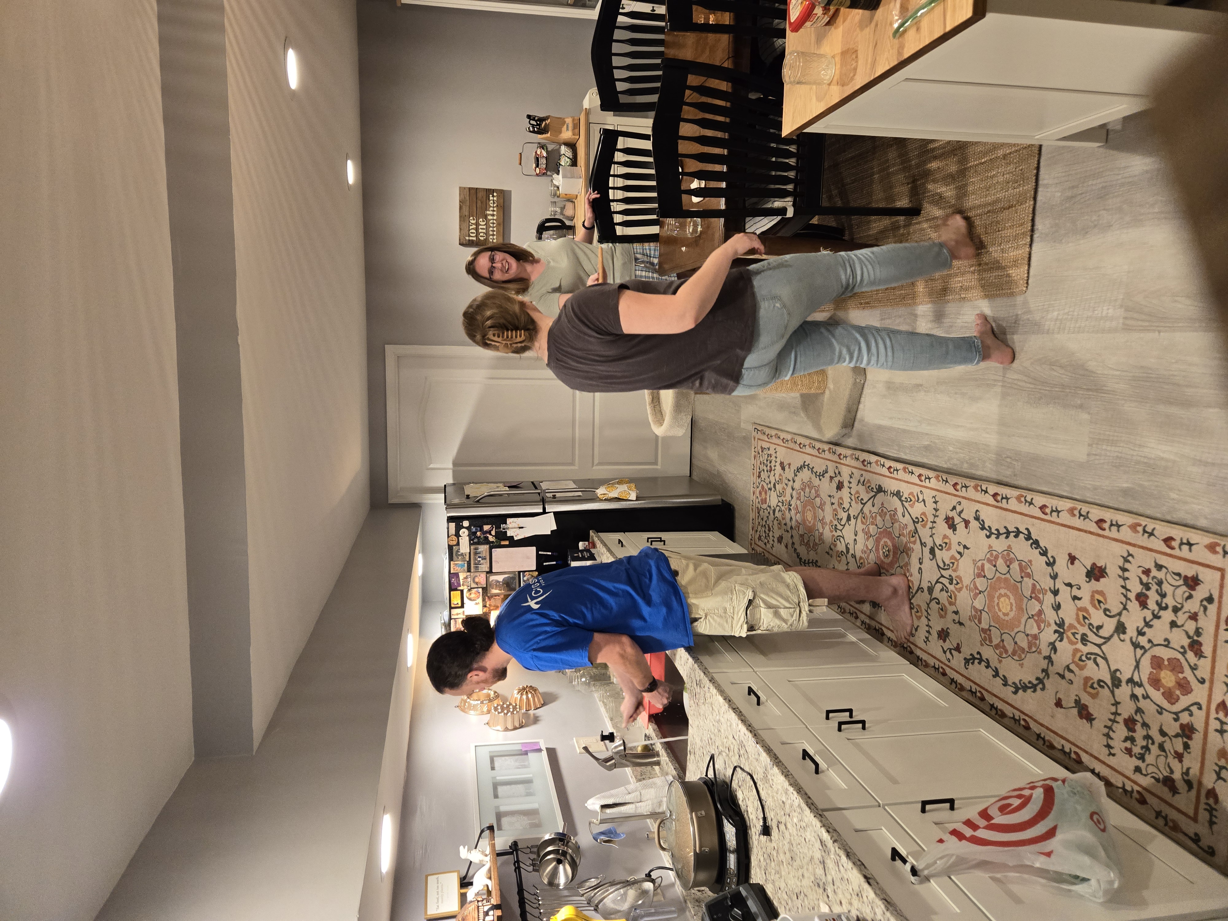 Janine, Jeremy, and Cassie in the kitchen