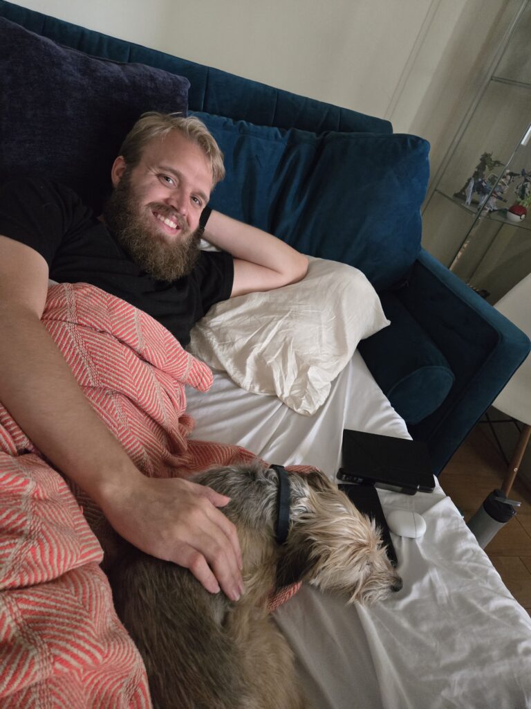 Teddy and Rocco snuggling in bed